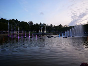 Group of people in calm lake