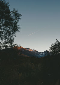 Low angle view of silhouette mountain against sky