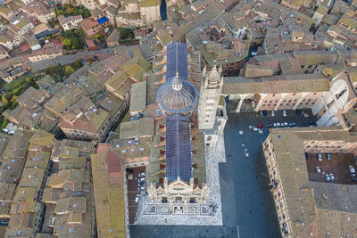 Aerial top down view of duomo di siena, the romanesque gothic cathedral 