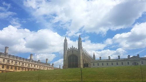 View of temple against cloudy sky