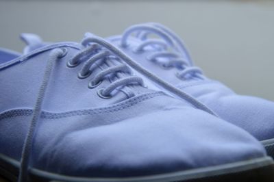 Close-up of white canvas shoes