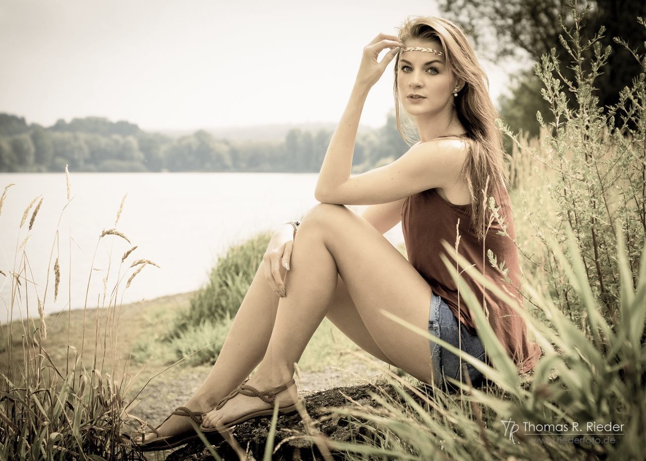 young adult, sitting, one person, young women, full length, beauty, beautiful woman, real people, water, one young woman only, nature, day, portrait, lake, outdoors, women, tree, sky, adults only, wedding dress, adult, people