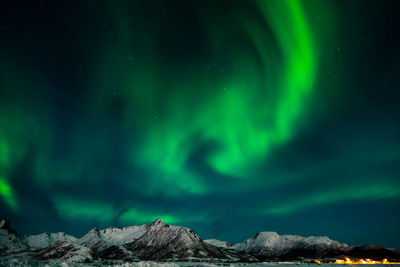 Low angle view of dramatic sky at night