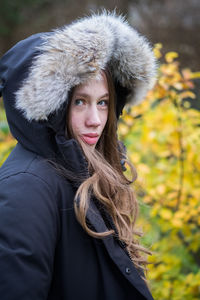Portrait of woman wearing fur coat 