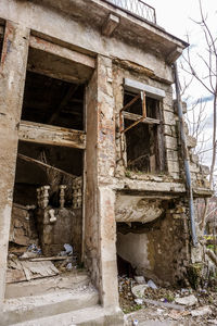 Broken window of old abandoned building