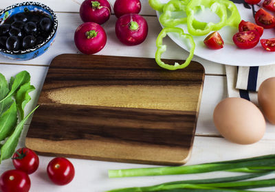 Fruits and vegetables on cutting board