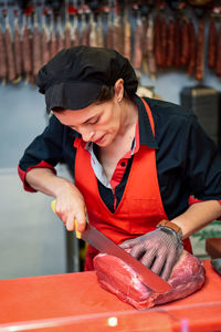 Midsection of man preparing food