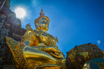 Low angle view of statue against sky