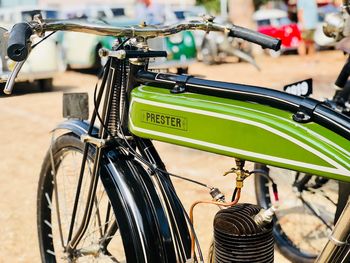 Close-up of bicycle parked in row