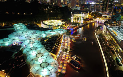 High angle view of illuminated cityscape at night