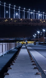 Bridge over road at night