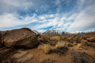 Scenic view of snowcapped mountains against sky