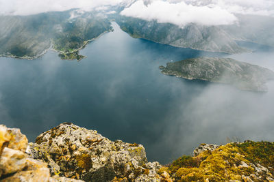 Aerial view of mountain by sea