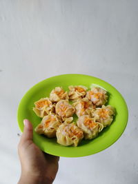 Close-up of hand holding food