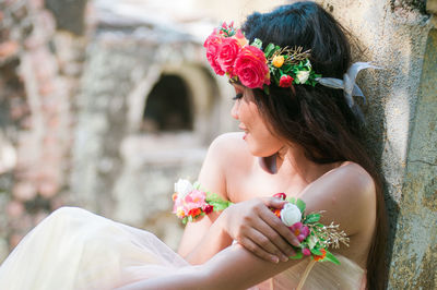 Close-up of girl holding flower