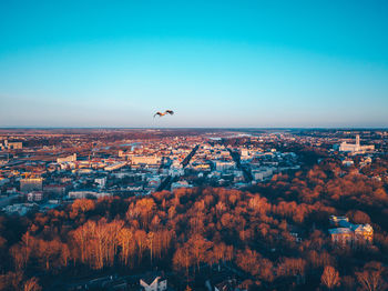 Aerial view of townscape against clear sky