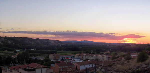 High angle view of houses at sunset