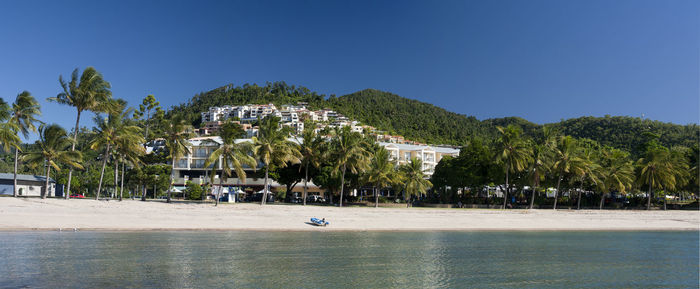Scenic view of sea against clear blue sky