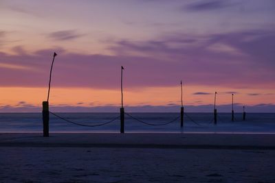 Scenic view of sea against sky at sunset