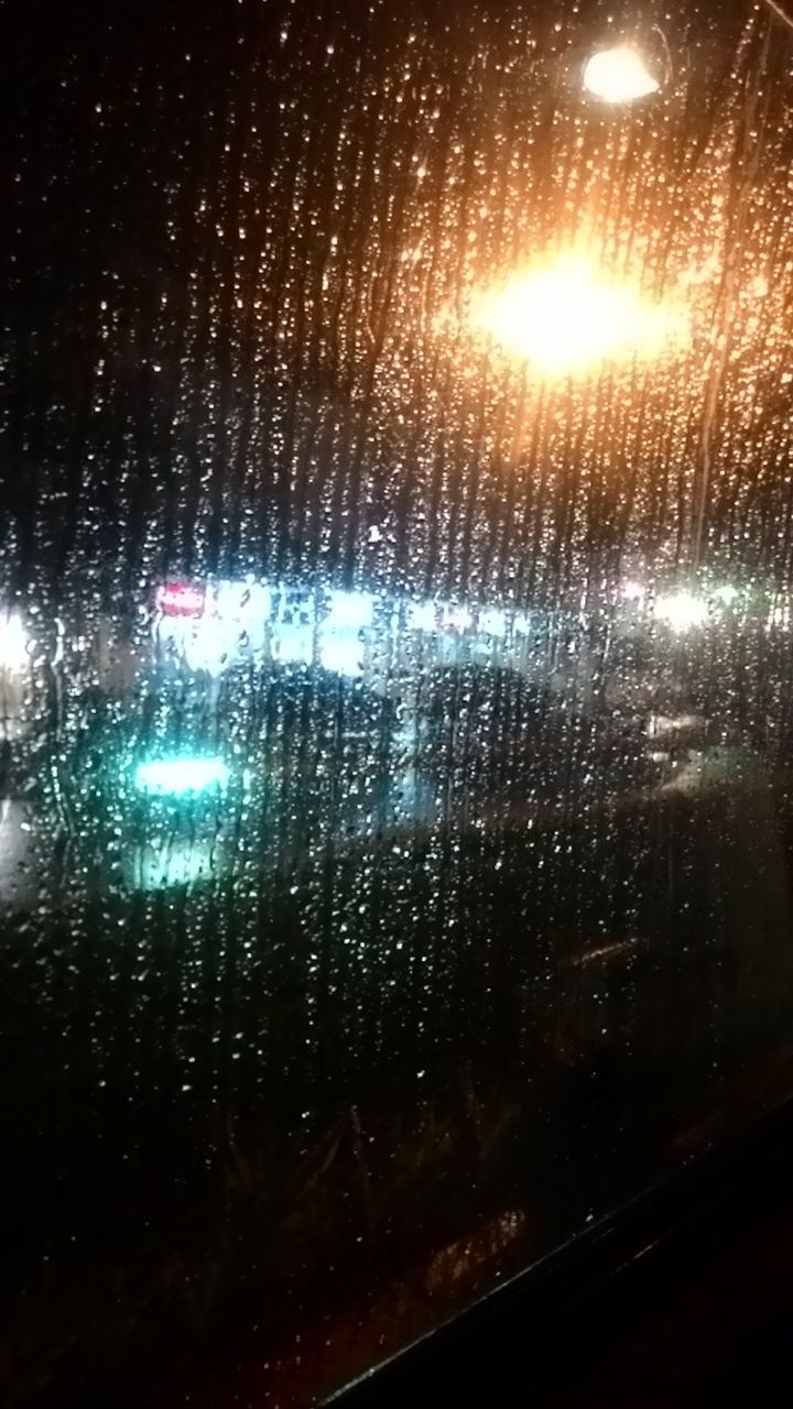 rain, glass - material, window, wet, drop, weather, raindrop, water, backgrounds, illuminated, no people, condensation, windshield, night, transportation, close-up, mode of transport, land vehicle, indoors, nature, sky