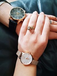 High angle view of woman hand on wall