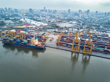 High angle view of river amidst buildings in city