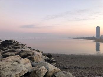 Scenic view of sea against sky at sunset