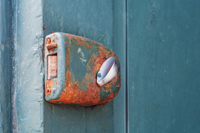 Close-up of old rusty metal door