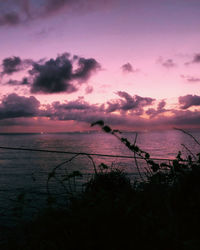 Scenic view of sea against sky at sunset