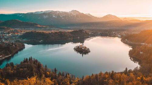 Sunrise at bled lake, slovenia, mountain, mountain range, lake, water, island.