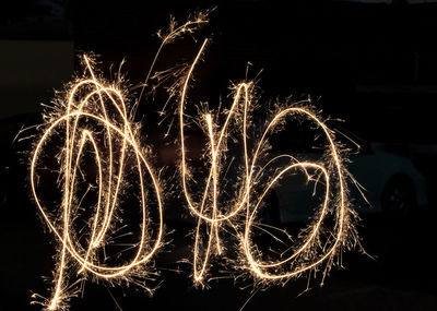 Close-up of illuminated light painting at night
