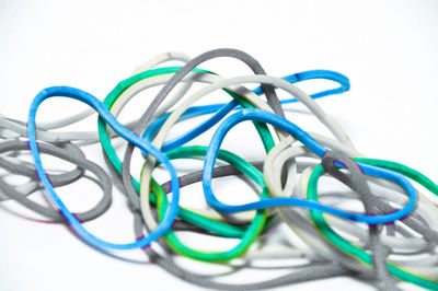 Close-up of blue wheel against white background