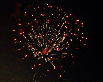 Low angle view of firework display