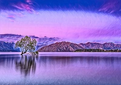 Scenic view of lake and mountains against sky during winter