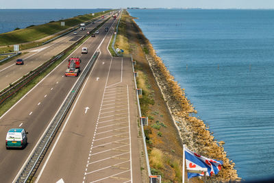 High angle view of highway by sea