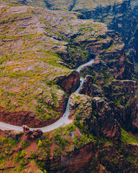 High angle view of road by rock formation