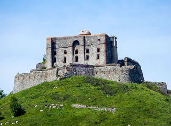 Low angle view of historic building against clear sky