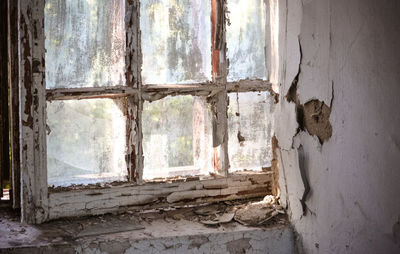 Old abandoned house window