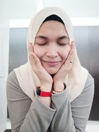 Portrait of a smiling young woman