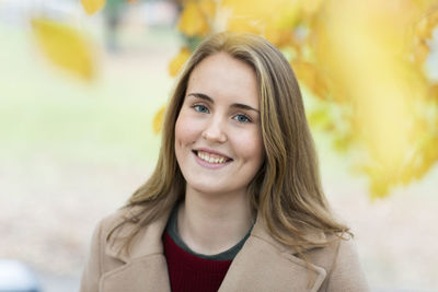 Portrait of smiling young woman