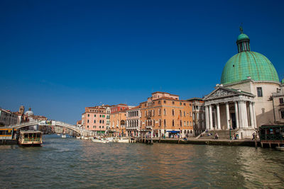 View of buildings against blue sky