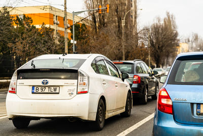 View of cars parked on road