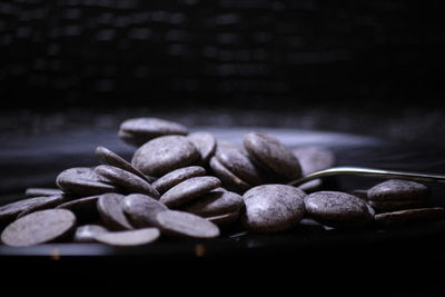 Close-up of coffee beans on table