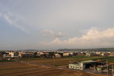 High angle view of buildings against sky