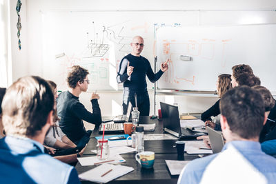 Business colleagues working at office