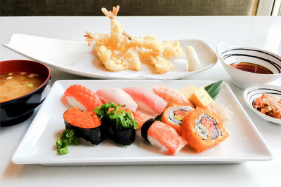 Close-up of sushi served on table