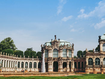 Facade of historic building against sky