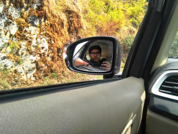 Portrait of man in car