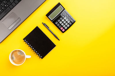 High angle view of coffee cup on table