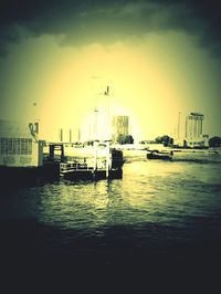 Boat in sea at sunset